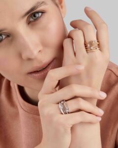 woman wearing annamaria cammilli dune rings