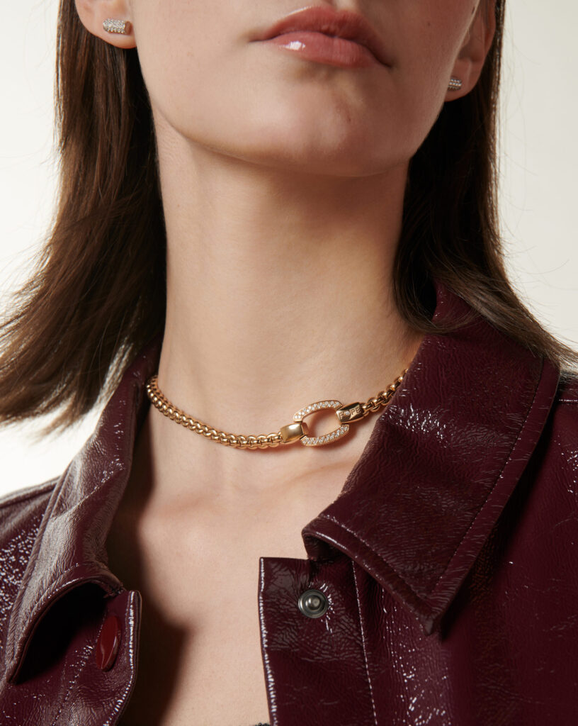 woman wearing fope eka necklace