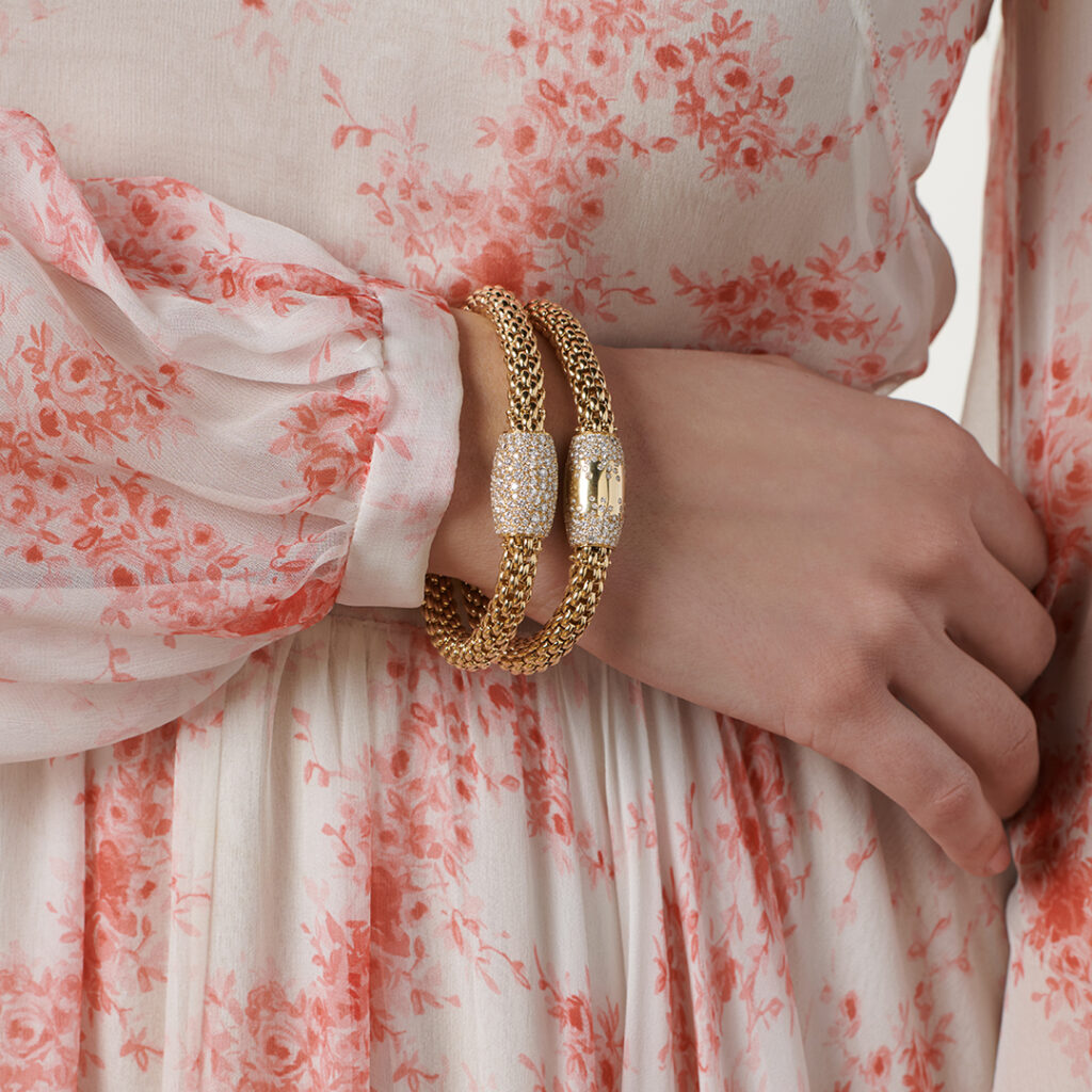 woman wearing fope love nest bracelets on wrist