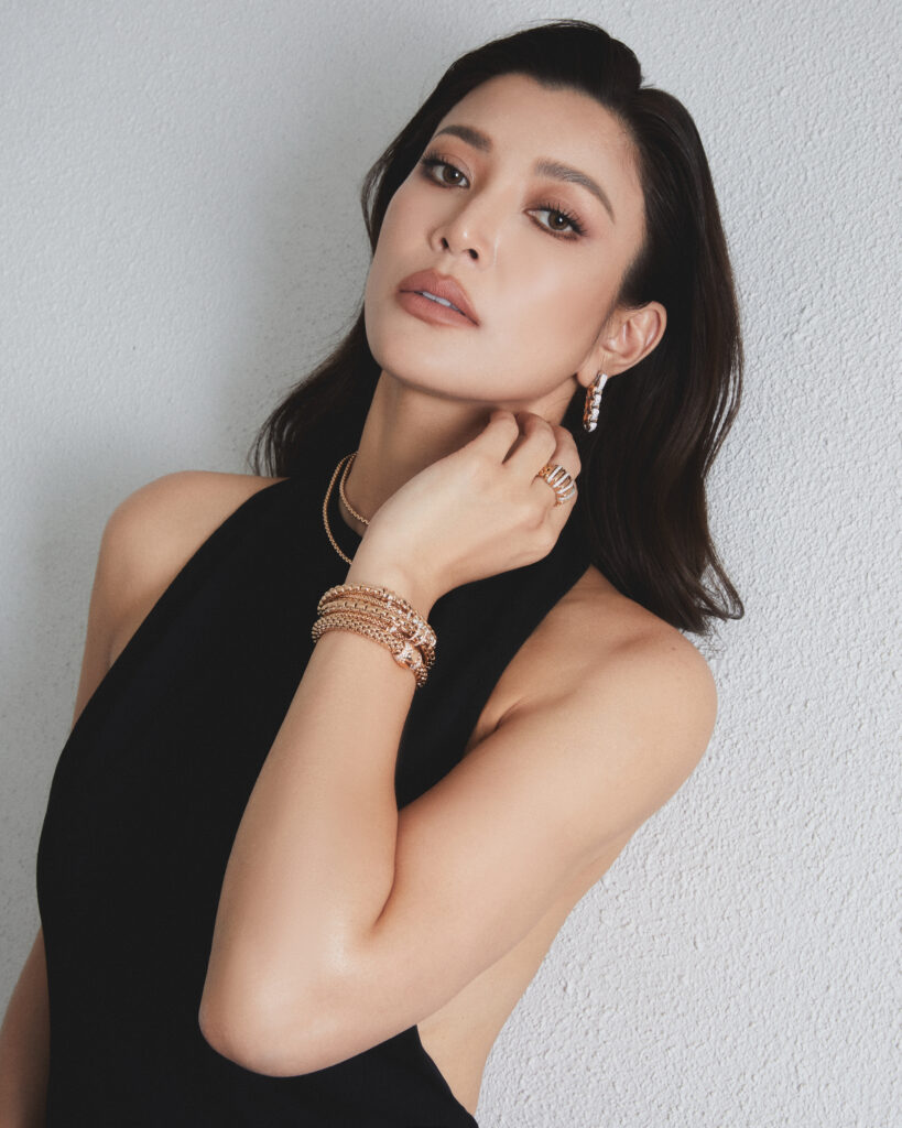 model wearing rose gold fope jewelry