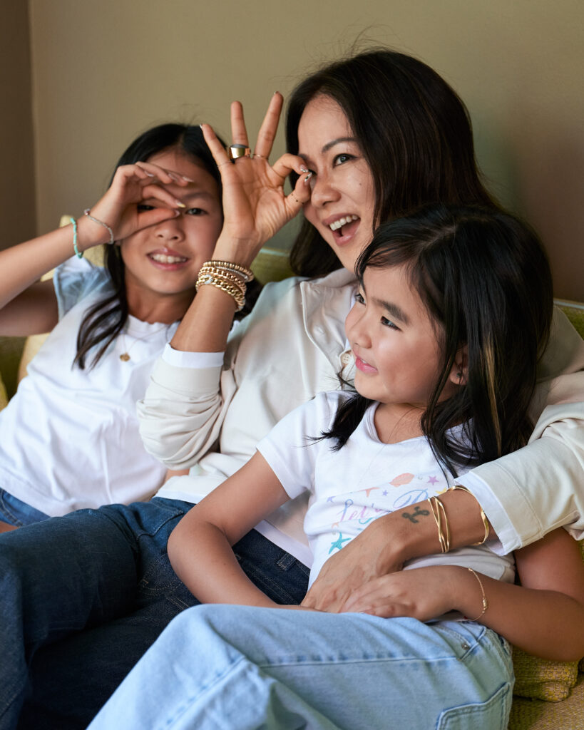 khun mo being playful with her daughters